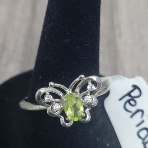 Elegant Butterfly Ring with Peridot Center